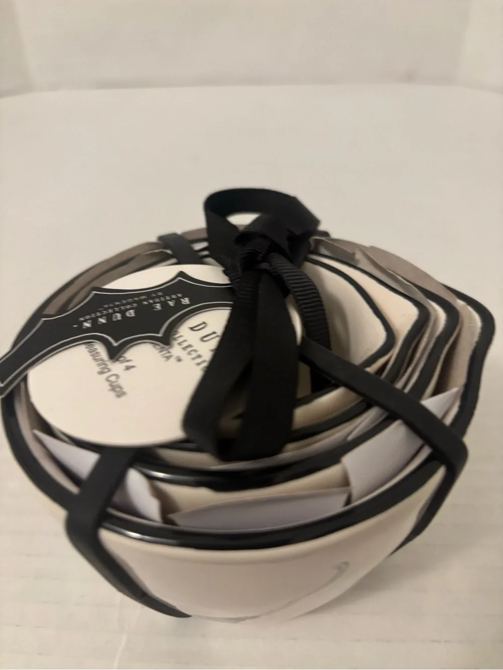 Rae Dunn White Ceramic Tea Infuser Cup with Black Broom Motif